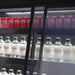 Combisteel wall-mounted three-door glass display fridge with LED lighting and digital temperature control view 2