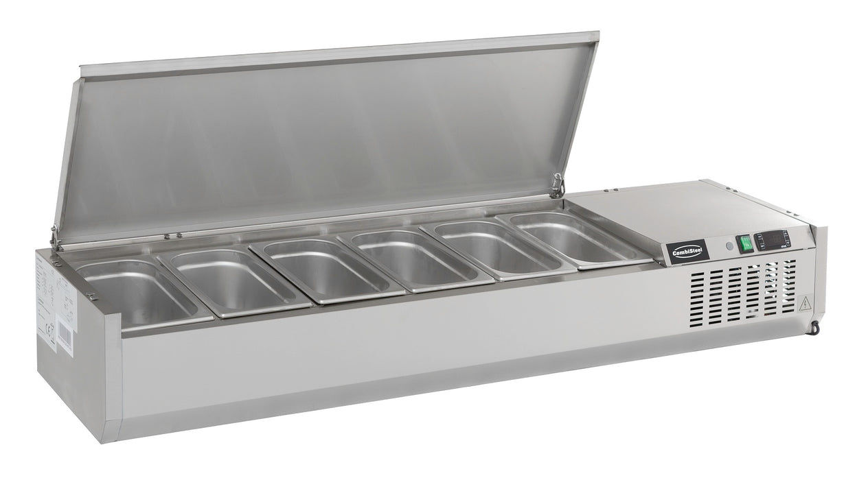 Stainless steel refrigerated countertop with recessed pan wells and sliding bar access. view 2