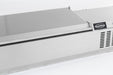 Stainless steel refrigerated countertop with recessed pan wells and sliding bar access. view 3
