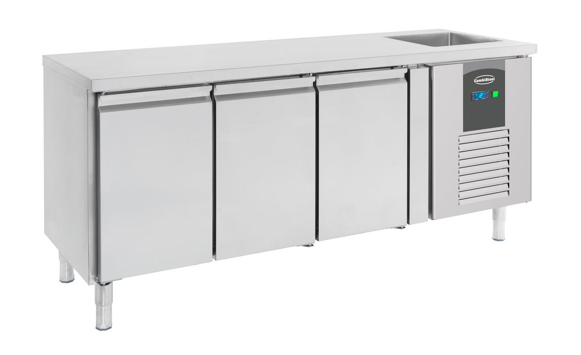 Stainless steel three door refrigerated counter with integrated sink basin