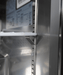 Stainless steel single door counter freezer with digital display and right-hinged door. view 7