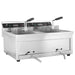 Stainless steel countertop electric fryer with two fry baskets and control panel. view 2