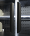 Black three door wall mounted display fridge with LED lighting and glass doors view 7