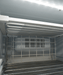 White single glass door upright freezer with LED lighting and five wire shelves view 6