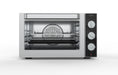 Stainless steel tabletop convection oven with glass door and rotisserie attachment