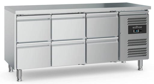 Stainless steel refrigerated counter with six pull-out drawers and adjustable feet
