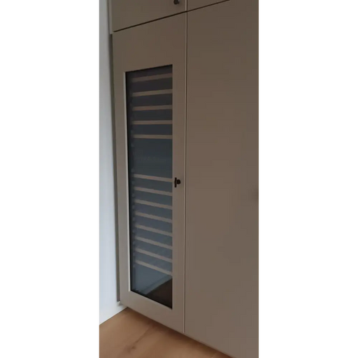 Pevino Majestic 101 bottle dual zone kitchen door wine cooler, side view